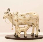 Handcrafted Polyresin Kamdhenu Cow Pearl White With Gold Fowling Effect Figurine with Calf for Full Filling Wishes of Human Being (Multicolour, 27x14x22) cm - Image 2