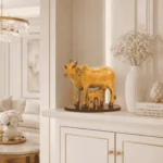 Handcrafted Polyresin Kamdhenu Cow Gold With Gold fowling Effect Figurine with Calf for Full Filling Wishes of Human Being (Multicolour, 27x14x22) cm